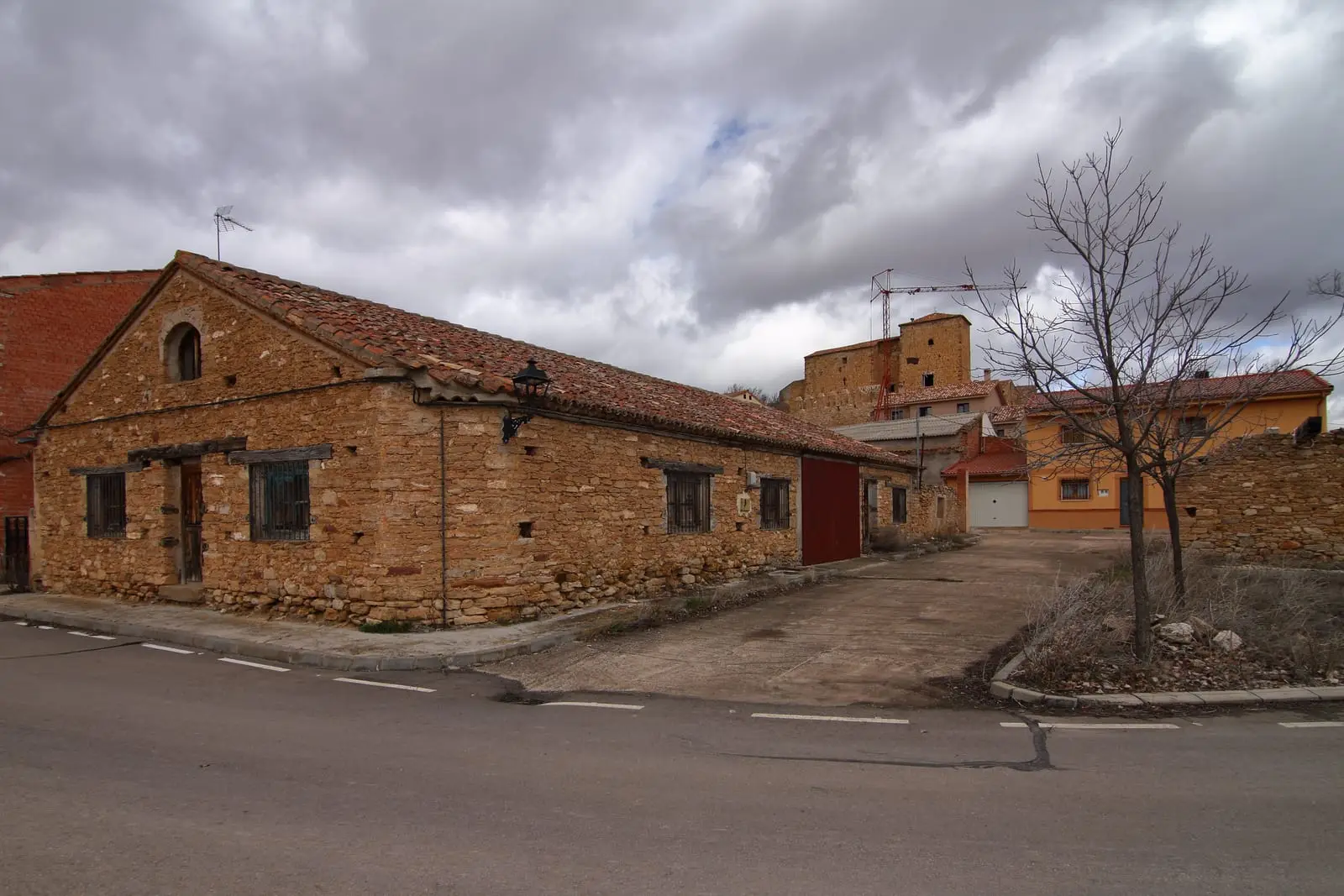 Castilnuevo’s stone houses, with the castle tower in the village.