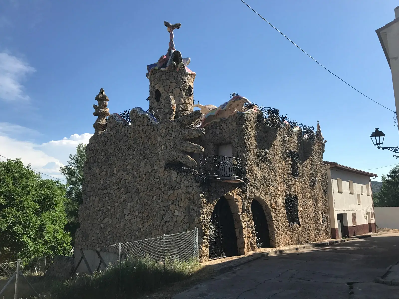 Stone and iron construction of El Capricho Rillano on a Rillo de Gallo street.
